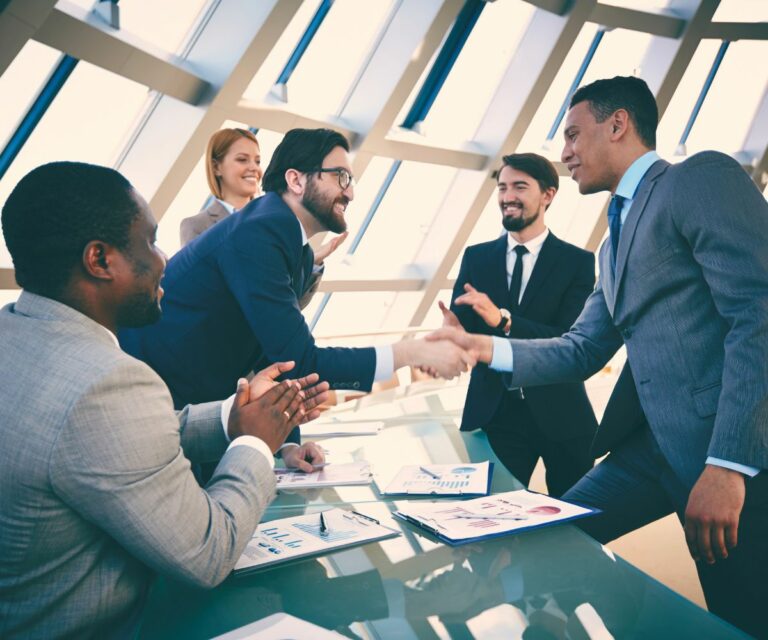 AMS Funding team meeting with a business client